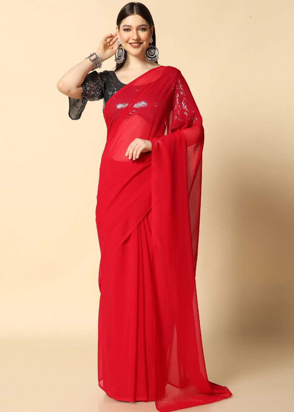 Deep red georgette saree with stone work and antique crushed gota bord