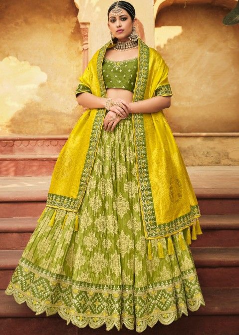 Photo of Pastel Pink and Mango Lehenga with Parrot Green Dupatta