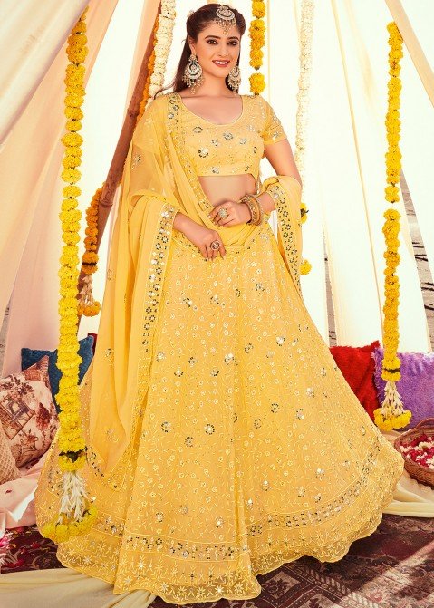 Buy Yellow Net Sequence Embroidered Bridal Lehenga Choli with Fancy Dupatta