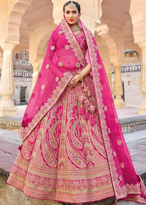 RED BRIDAL LEHENGA WITH STITCHED BLOUSE AND A HEAVY DUPATTA | gintaa.com