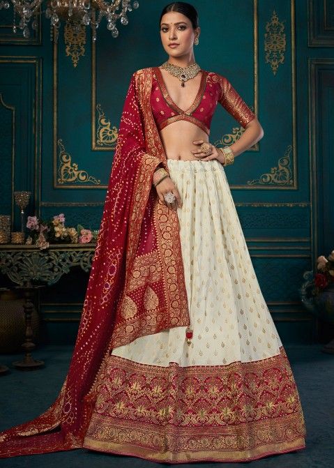 Cream White & Red Banarasi Silk Lehenga Choli with Khatli work Embroid –  Ethnos