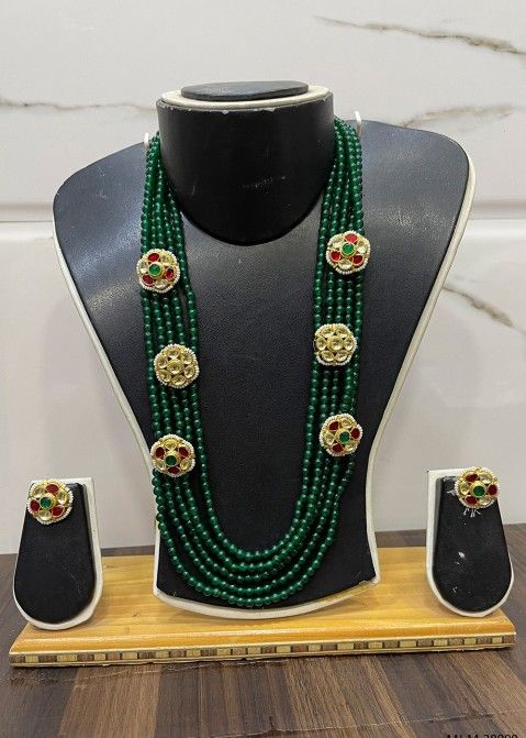 Green Kundan Studded Multi Layered Necklace Set