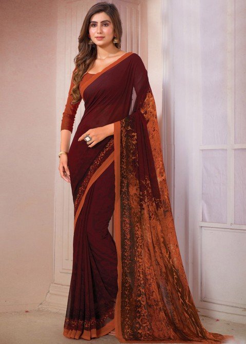 Border Work Designs On Maroon Georgette Fabric Party Wear Saree With  Designer Blouse