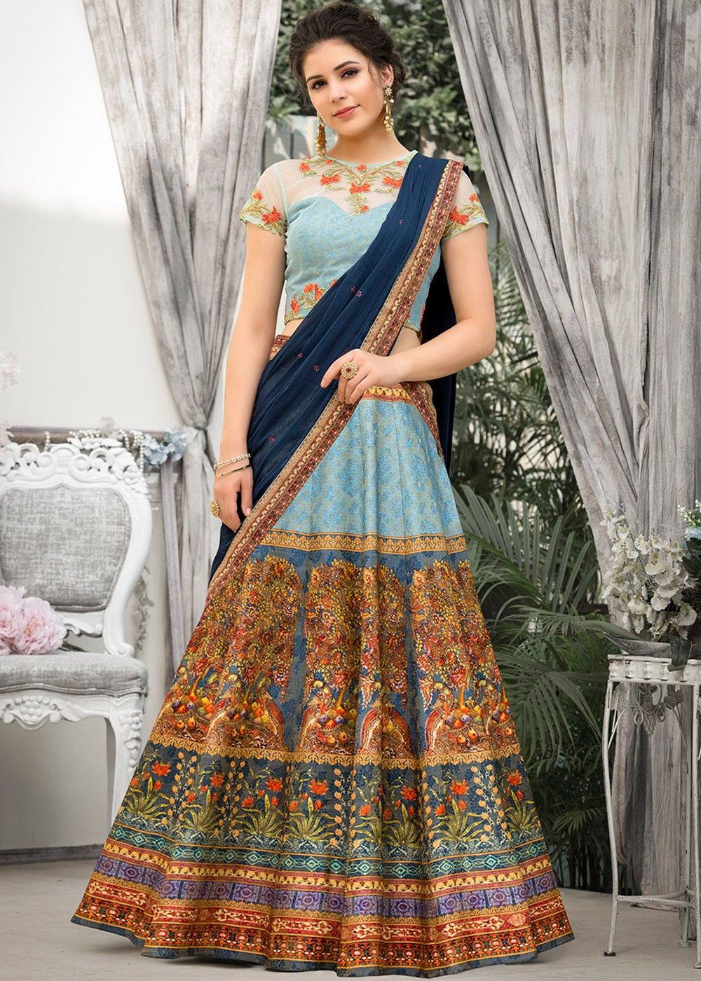 Photo of Turquoise and Orange Lehenga | Orange lehenga, Lehenga designs,  Indian dresses