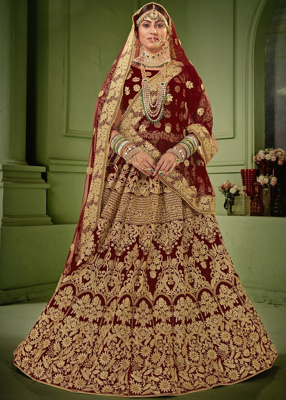 Flattering Red Colored Designer Bridal wear Embroidered Lehe