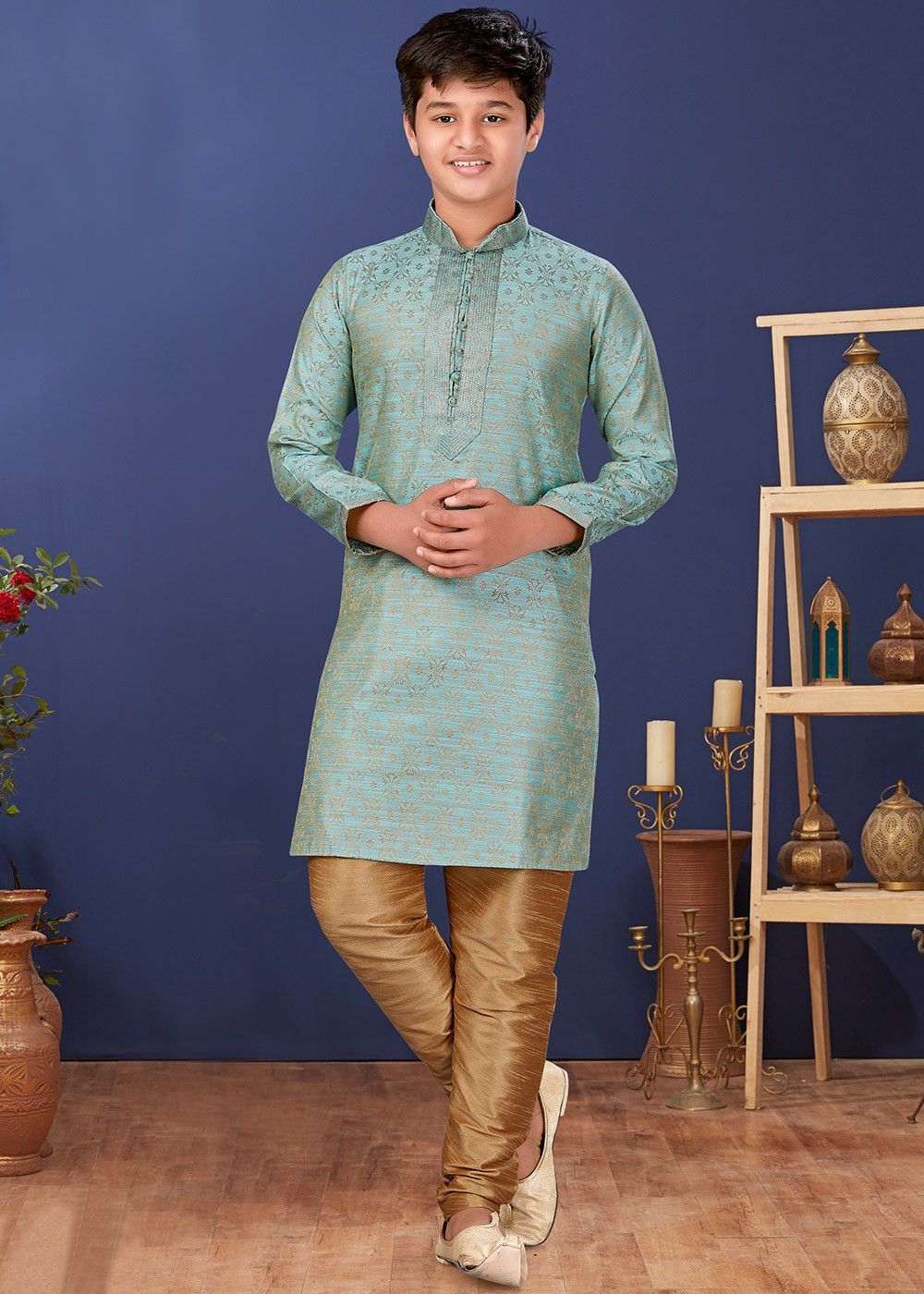 A good looking Indian young guy posing with sitting on chair with wearing  kurta, pajama, nehru coat and sunglasses with looking sideways Stock Photo  - Alamy