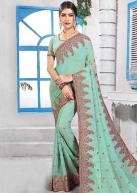 Turquoise Georgette Embroidered Saree With Blouse
