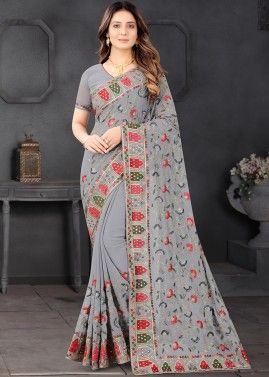 Grey Heavy Border Saree In Georgette With Blouse