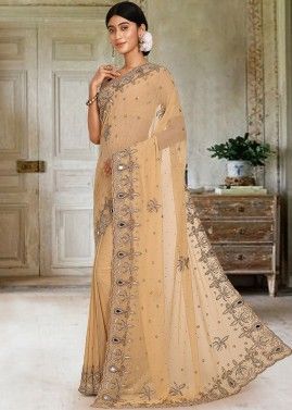 Cream Embroidered Georgette Saree With Blouse
