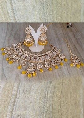 Yellow Wedding Wear Kundan Studded Necklace Set