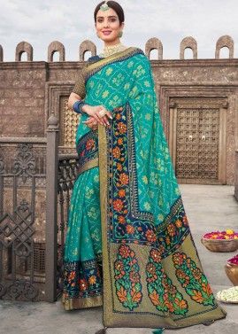 Turquoise Georgette Brasso Saree With Heavy Border