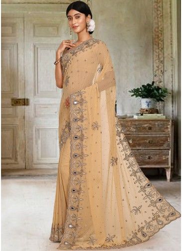Cream Embroidered Georgette Saree With Blouse