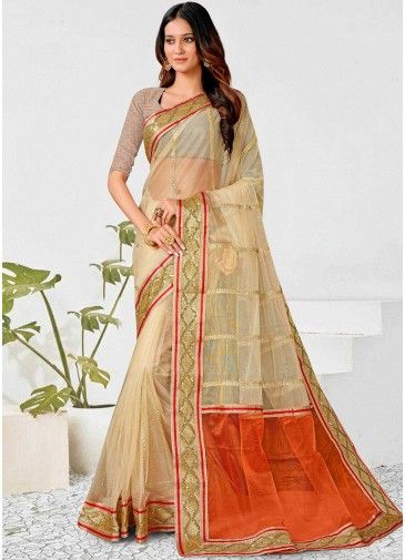 Cream Embroidered Net Saree With Blouse