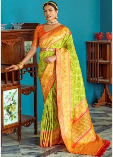 Green Woven Banarasi Silk Saree & Blouse