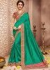 Green Banarasi Silk saree with Heavy Blouse