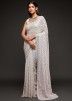 White Sequins Embroidered Heavy Saree In Georgette