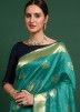 Turquoise Woven Tussar Silk Saree With Blouse