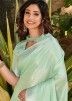 Green Classy Linen Saree In Zari Woven