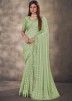 Green Woven Georgette Saree & Blouse