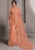 Peach Embroidered Ruffled Saree In Net