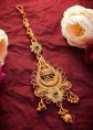 Stone Studded Magenta and Golden Traditional Maang Tikka