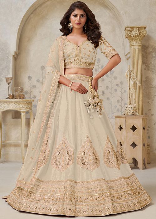 Cream Silk Lehenga Choli With Golden Embroidery