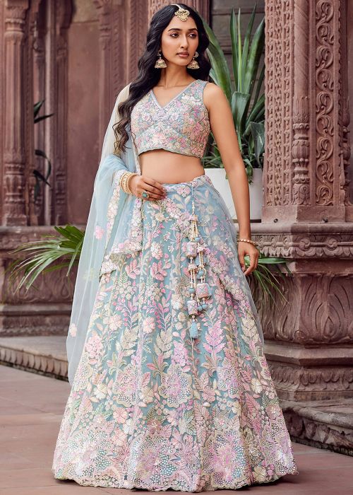 Turquoise Net Lehenga Choli With Embroidered Motifs
