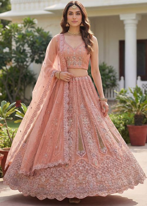 Peach Net Lehenga Choli With Delicate Sequins