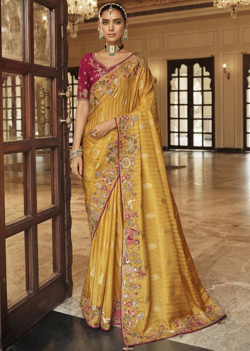 Yellow Embellished Silk Saree With Pink Blouse