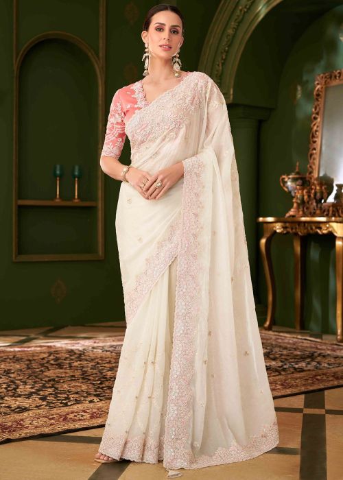 Off White Georgette Saree With Pink Embroidered Blouse