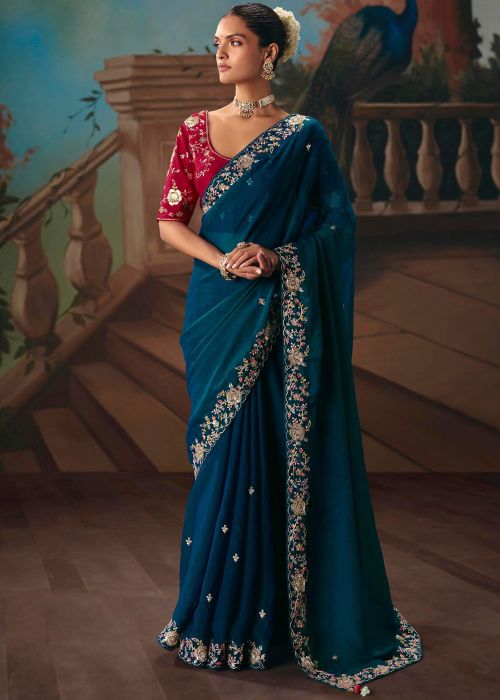 Teal Blue Tissue Saree With Floral Zari Border