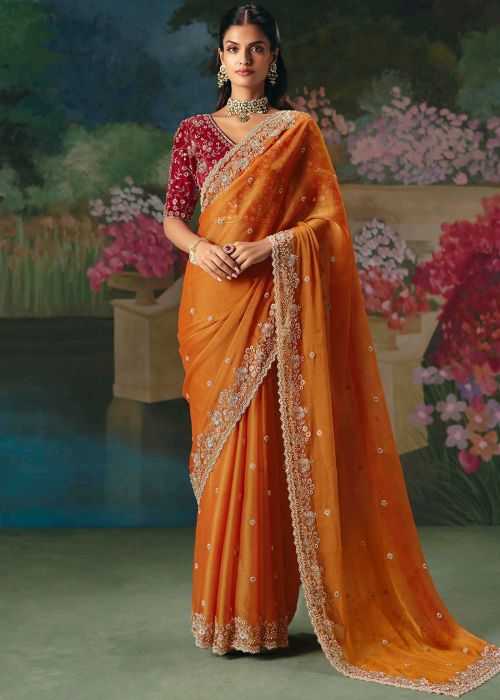 Orange Silk Saree With Red Embroidered Blouse
