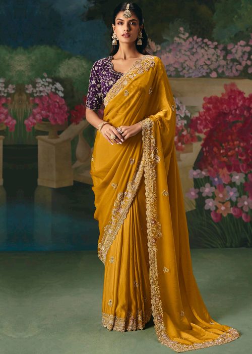 Yellow Embellished Silk Saree With Purple Blouse