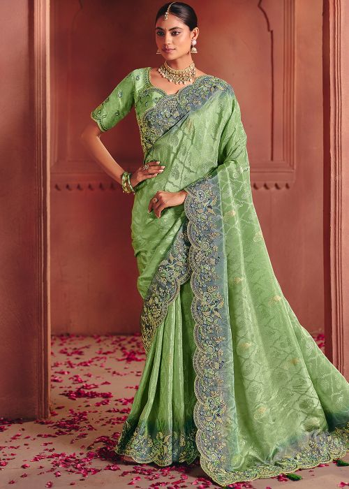 Green Silk Saree With Zari Woven Accents