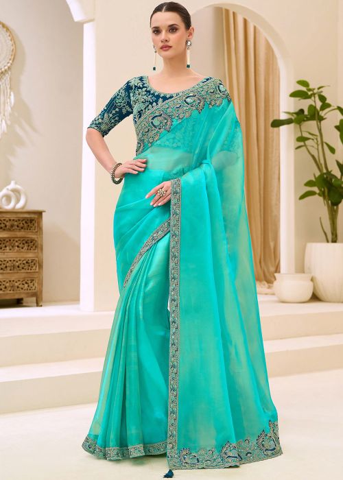Turquoise Georgette Saree With Peacock Embroidered Border