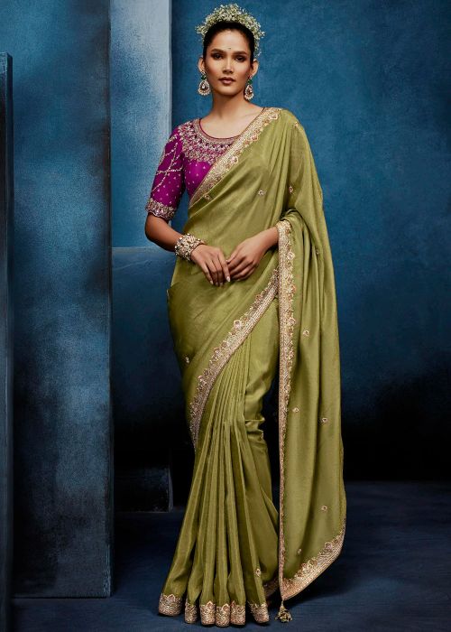 Green Tissue Saree With Pink Embroidered Blouse
